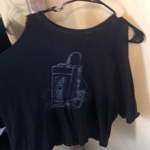 adorable top with holes in the shoulder, cute with mom jeans with some booties!